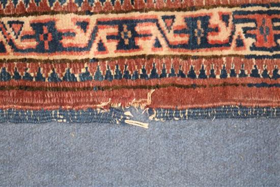 A Bokhara rug with traditional all-over panelled design, 150cm x 145cm